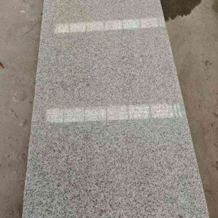 上饶芝麻白光面毛板