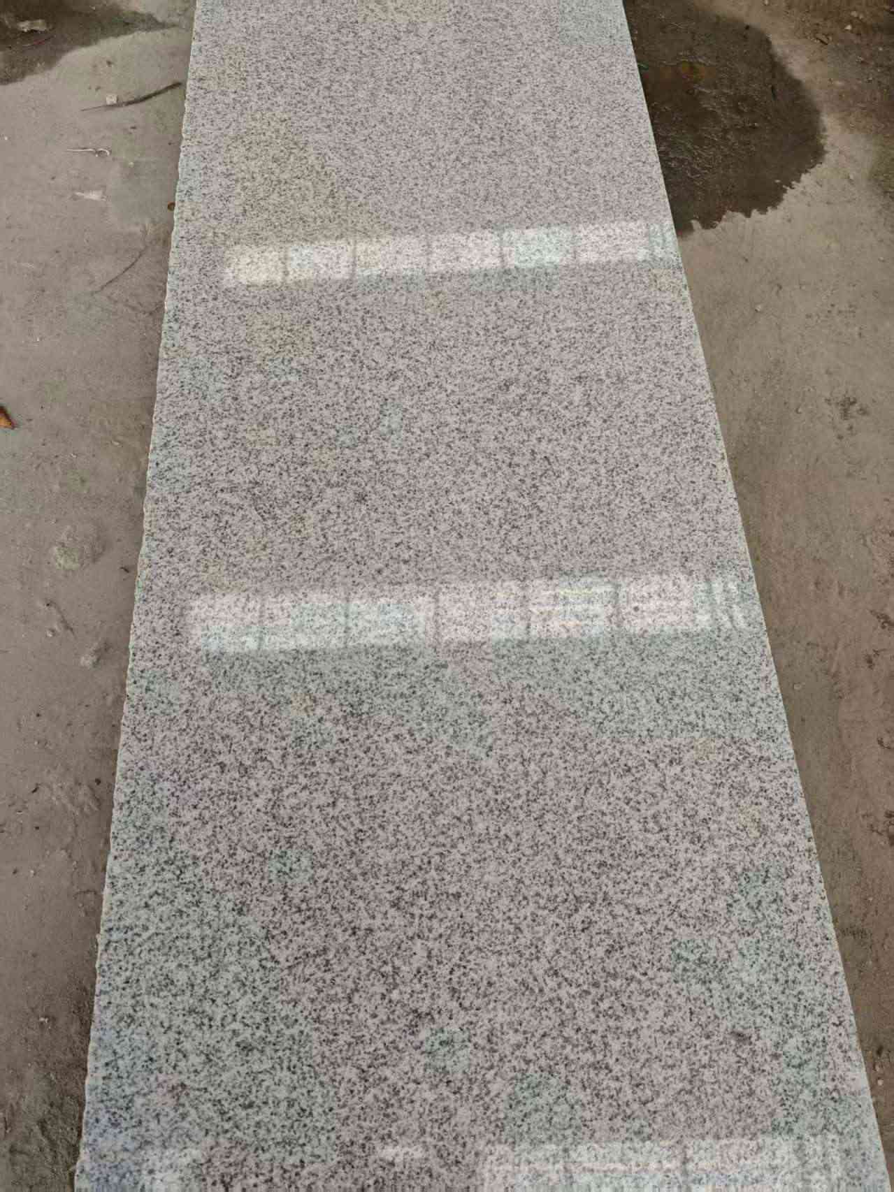 上饶芝麻白光面毛板